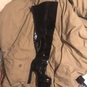 Thigh high faux leather booths *super sexy*